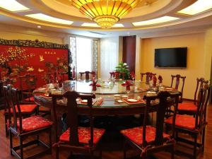 TV a/nebo společenská místnost v ubytování Beijing Jiangsu Plaza Hotel