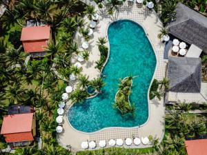 an overhead view of a swimming pool at a resort at Pandanus Resort in Mui Ne