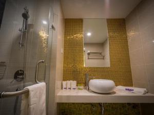 Koupelna v ubytování WIWO Hotel