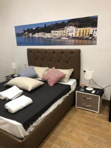 Postel nebo postele na pokoji v ubytování Casa Vacanze Riva Destra