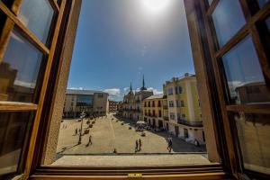a view of a city from a window at Hotel Aroi Bierzo Plaza in Ponferrada