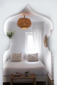 Postel nebo postele na pokoji v ubytování Hôtel Emeraude Essaouira
