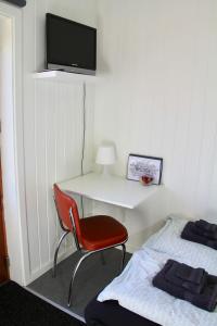 TV a/nebo společenská místnost v ubytování Nordic Inn Thorshavn
