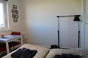 Postel nebo postele na pokoji v ubytování Nordic Inn Thorshavn