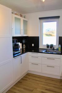 Kuchyň nebo kuchyňský kout v ubytování Nordic Inn Thorshavn