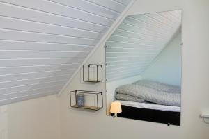 Postel nebo postele na pokoji v ubytování Nordic Inn Thorshavn