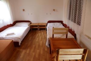 En eller flere senger på et rom på Resort Hotel Zvíkov