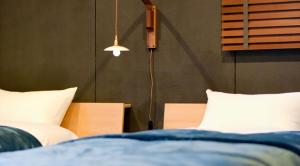 Letto o letti in una camera di SIMA inn