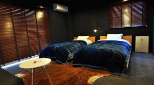 Letto o letti in una camera di SIMA inn