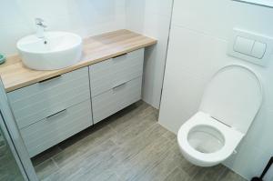 Koupelna v ubytování Apartmány Mary