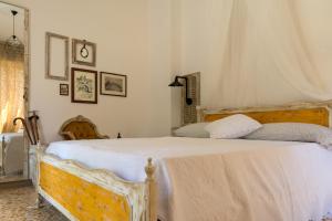 Letto o letti in una camera di La Casa Di Elda