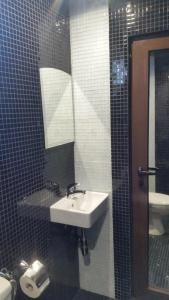 A bathroom at Banya Guest Rooms 23