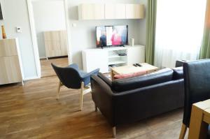 TV a/nebo společenská místnost v ubytování Apartmány Mary