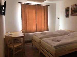 Postel nebo postele na pokoji v ubytování Penzion Hvězda - Restaurace dočasně uzavřena