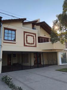 a large house with a gate in front of it at La casona de ensueño in Formosa