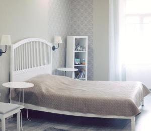 Ένα ή περισσότερα κρεβάτια σε δωμάτιο στο Lucky Apartment - Lviv Old Town