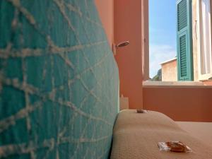Postel nebo postele na pokoji v ubytování Ai Pesci Room Rental