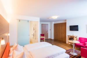 TV a/nebo společenská místnost v ubytování Hotel Walserberg