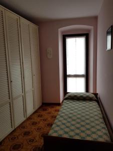 Posteľ alebo postele v izbe v ubytovaní B&B I Lazzarini