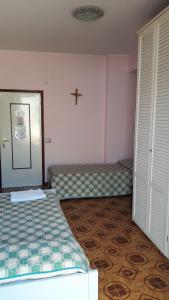 Posteľ alebo postele v izbe v ubytovaní B&B I Lazzarini