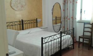 Postel nebo postele na pokoji v ubytování Pensione S. Antonio Ristorante Silvia