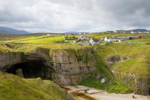 a view of a mountain with a tunnel in it at Durness Youth Hostel in Durness
