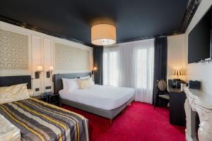 Säng eller sängar i ett rum på Best Western Le Montmartre – Saint Pierre