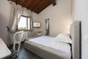 Postel nebo postele na pokoji v ubytování Hotel Le Macine + 37 fotografií