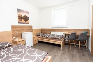 A bed or beds in a room at Pohoda Ubytovanie Stupava