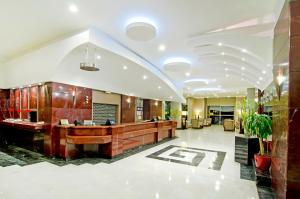Area lobi atau resepsionis di Korumar Hotel Deluxe
