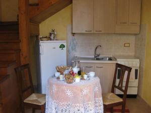 Kuchyňa alebo kuchynka v ubytovaní B&B Melius + 21 fotografií