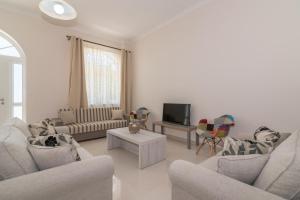 TV a/nebo společenská místnost v ubytování Luna Apartments