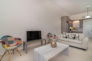 TV a/nebo společenská místnost v ubytování Luna Apartments