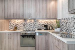 Kuchyň nebo kuchyňský kout v ubytování Luna Apartments
