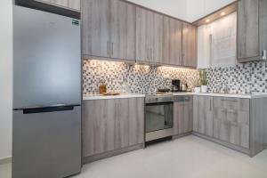 Kuchyň nebo kuchyňský kout v ubytování Luna Apartments