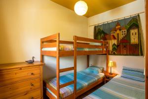 Двухъярусная кровать или двухъярусные кровати в номере B&B & Apartments The Four Elements