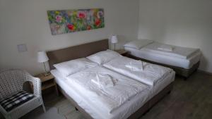 Postel nebo postele na pokoji v ubytování Apartmány Nova Lake