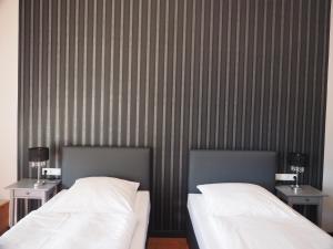 Hotel Kipphut tesisinde bir odada yatak veya yataklar