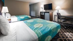 Postel nebo postele na pokoji v ubytování Travelodge by Wyndham San Antonio Downtown Northeast