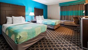 Postel nebo postele na pokoji v ubytování Travelodge by Wyndham San Antonio Downtown Northeast