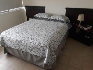 Letto o letti in una camera di Hotel Doral