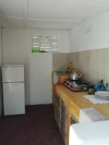 Kuchyň nebo kuchyňský kout v ubytování Sunny House Paje II