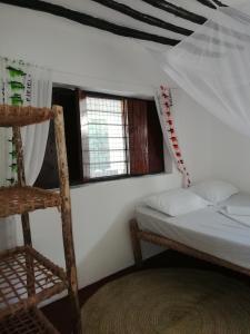 Postel nebo postele na pokoji v ubytování Sunny House Paje II