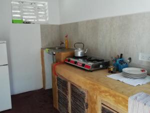 Kuchyň nebo kuchyňský kout v ubytování Sunny House Paje II