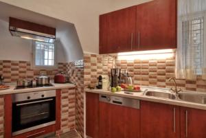 Kuchyňa alebo kuchynka v ubytovaní Angiolina Sea View Apartment