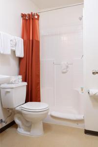 a bathroom with a toilet and a shower at Siegel Select Casa Grande in Casa Grande