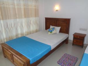 Llit o llits en una habitació de Jungle View Guest