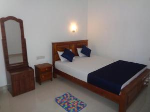 Llit o llits en una habitació de Jungle View Guest
