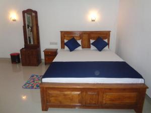 Llit o llits en una habitació de Jungle View Guest
