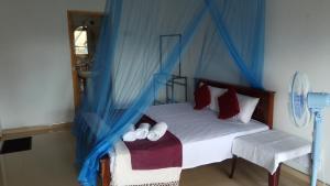 Voodi või voodid majutusasutuse Dreamscape home stay toas